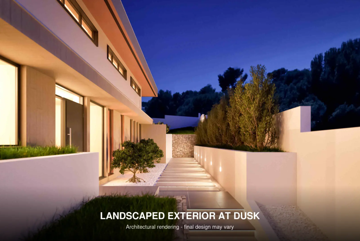 Landscaped exterior of contemporary Moraira villa at dusk